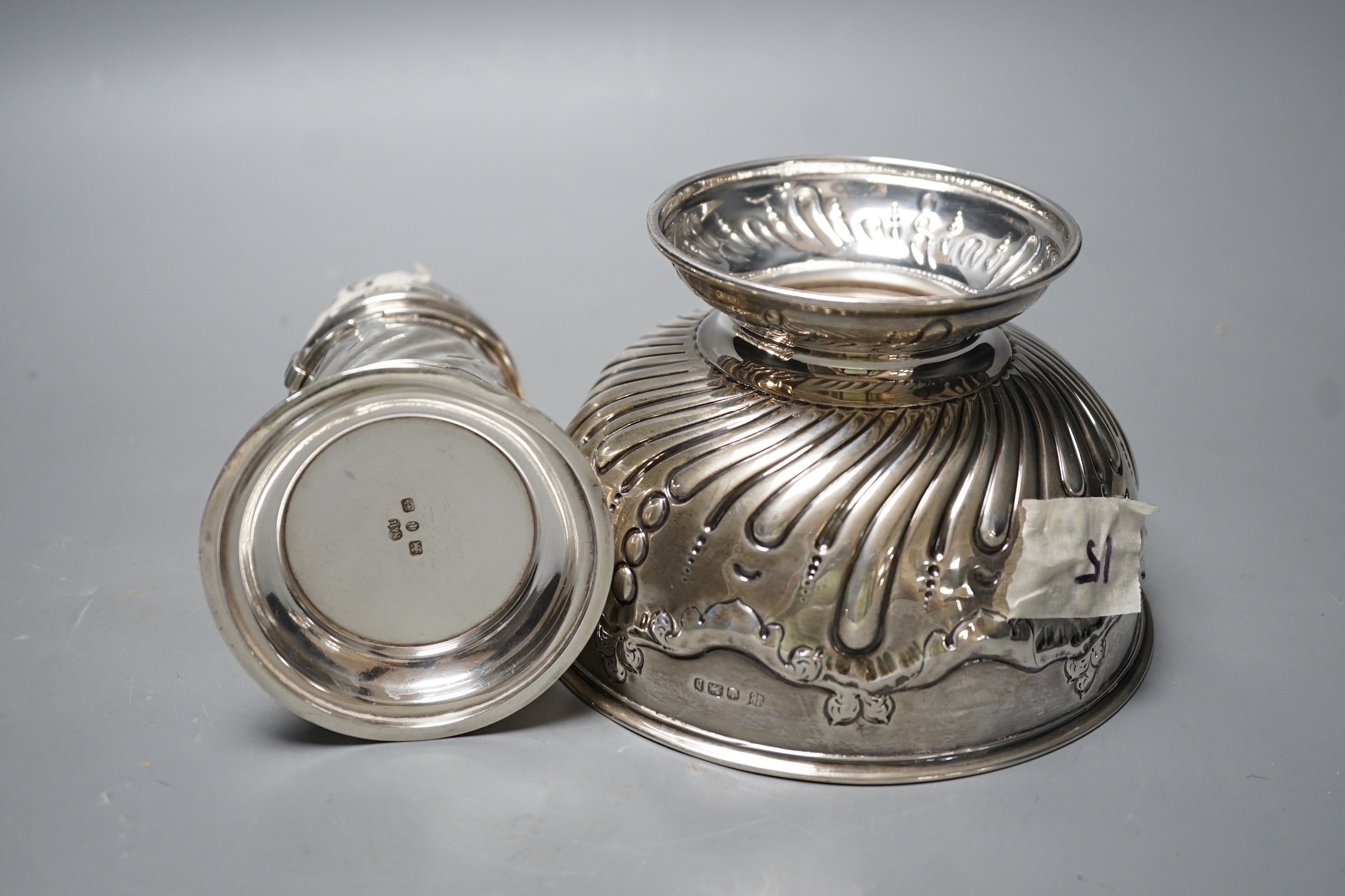 A late Victorian silver lighthouse sugar caster, Birmingham, 1893, 17.3cm and similar repousse rose bowl, 13.4oz.